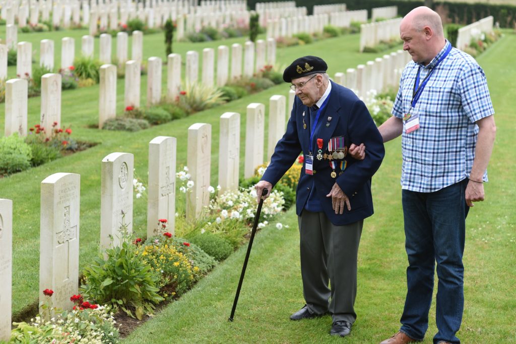 Military Veteran Albert Holmshaw with Taxi Charity Volunteer Danny Shelton visit a memorial