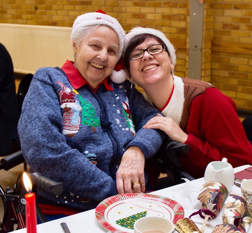 Two people smiling for a photo