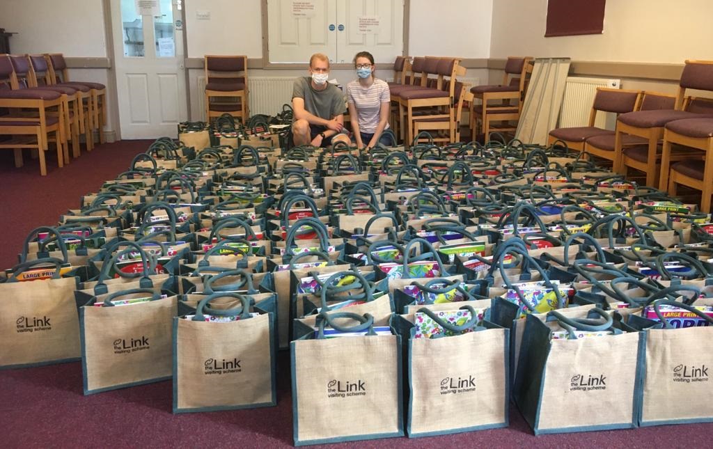 A large number of care bags in a room