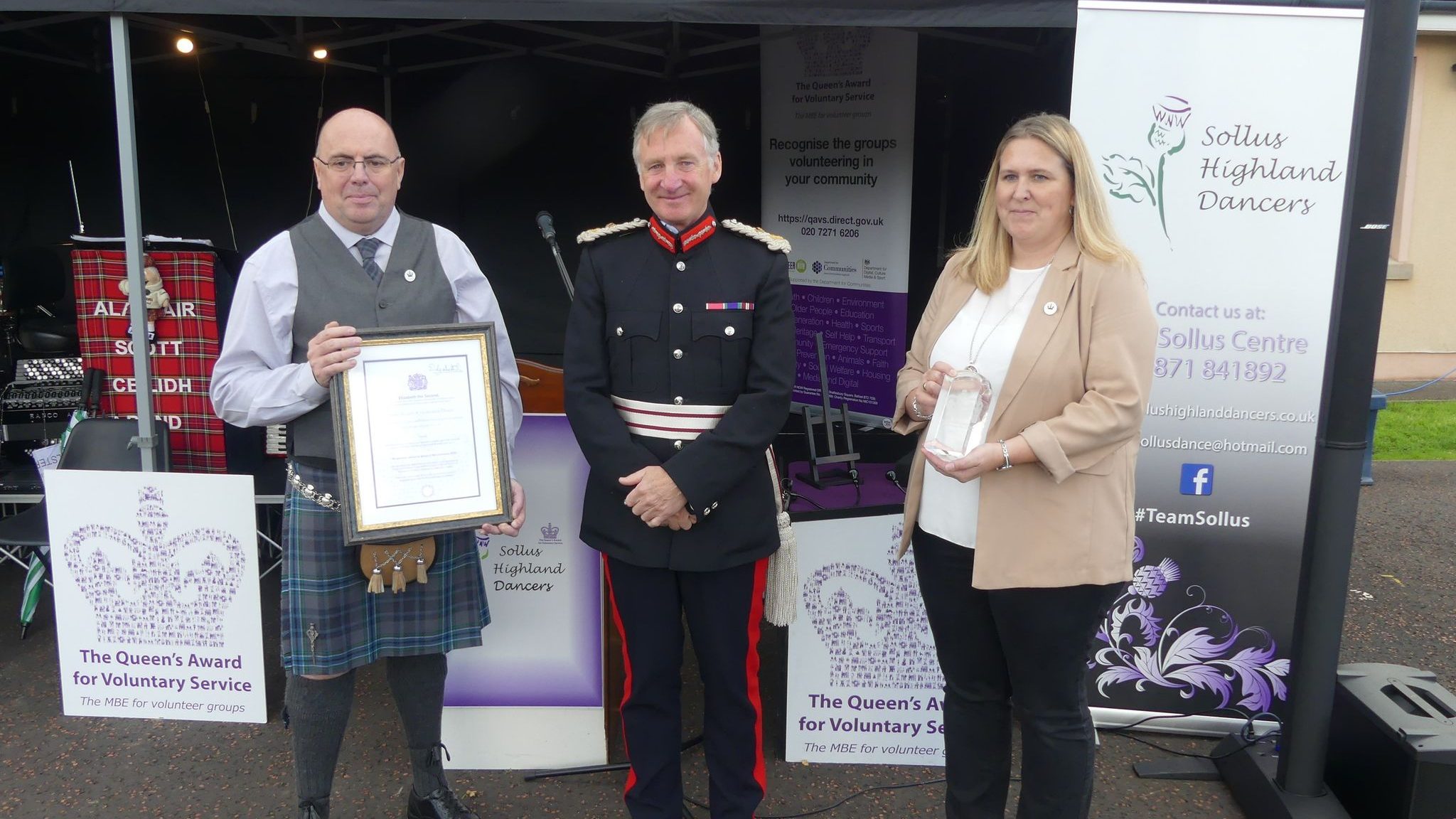 Our Secretary (Raymond Peart - left) and Treasurer (Yvette Cooke - right) receiving the award from Robert W. L. Scott O.B.E, Her Majesty's Lord Lieutenant of County Tyrone (centre)